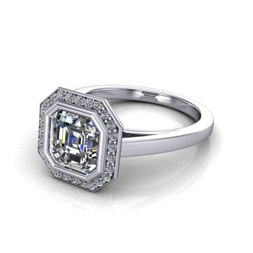 Rosie square emerald halo bezel-set engagement ring in 18K White Gold — three-quarter perspective showing the square emerald-cut (Asscher-style) center diamond, pavé diamond halo, and slim high-polish shank