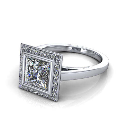 Rosie princess halo bezel-set engagement ring in 18K White Gold — three-quarter perspective showing the princess-cut center diamond, pavé diamond halo, and slim high-polish shank