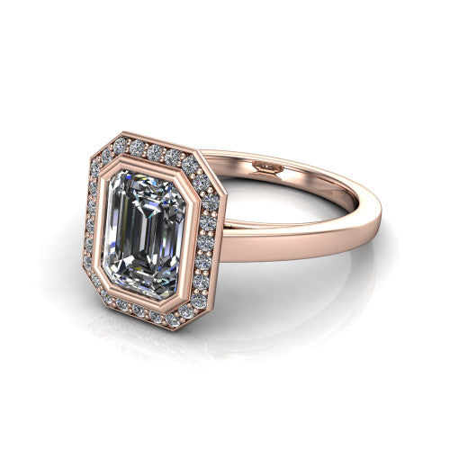 Rosie emerald halo bezel-set engagement ring in 14K Rose Gold — three-quarter perspective showing the emerald-cut center diamond, pavé diamond halo, and slim high-polish shank