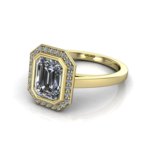 Rosie emerald halo bezel-set engagement ring in 18K Yellow Gold — three-quarter perspective showing the emerald-cut center diamond, pavé diamond halo, and slim high-polish shank