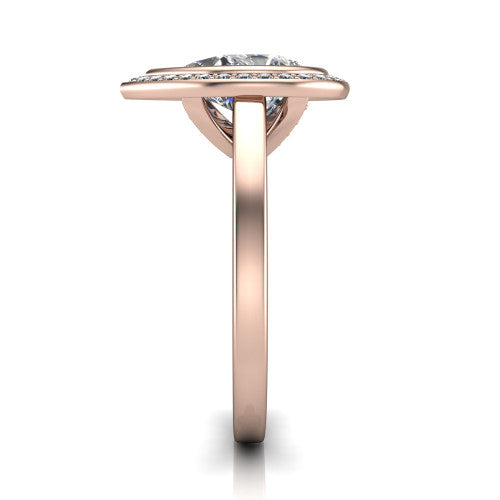 Rosie pear halo bezel-set engagement ring in 18K Rose Gold — side profile showing the bezel-set pear-cut center stone, halo silhouette, and slim cathedral shank