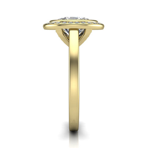 Rosie oval halo bezel-set engagement ring in 14K Yellow Gold — side profile showing the bezel-set oval-cut center stone, halo silhouette, and slim cathedral shank