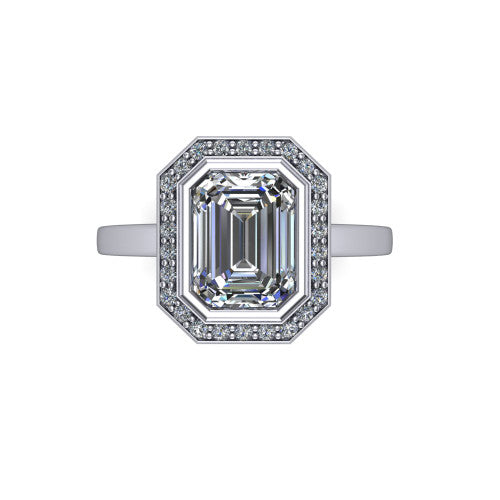 Rosie emerald halo bezel-set engagement ring in 14K White Gold — top-down view showing the emerald-cut center stone framed by the full diamond halo and bezel outline