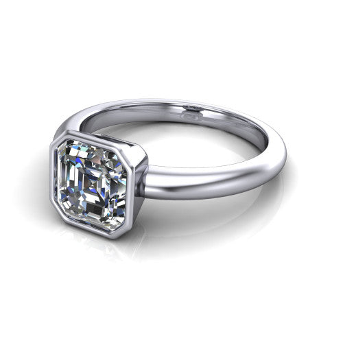 Lauren square emerald bezel solitaire engagement ring in 18K White Gold, three-quarter perspective showing the bezel-set square emerald center diamond on a polished band