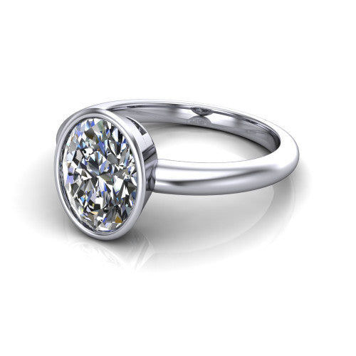 Lauren oval bezel solitaire engagement ring in 14K White Gold, three-quarter perspective showing the bezel-set oval center diamond on a polished band