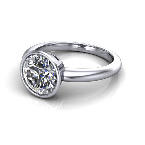 Lauren round bezel solitaire engagement ring in 14K White Gold, three-quarter perspective showing the bezel-set round center diamond on a polished band