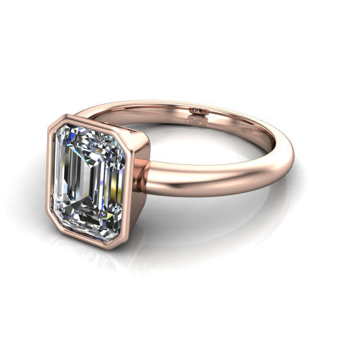 Lauren emerald bezel solitaire engagement ring in 14K Rose Gold, three-quarter perspective showing the bezel-set emerald center diamond on a polished band
