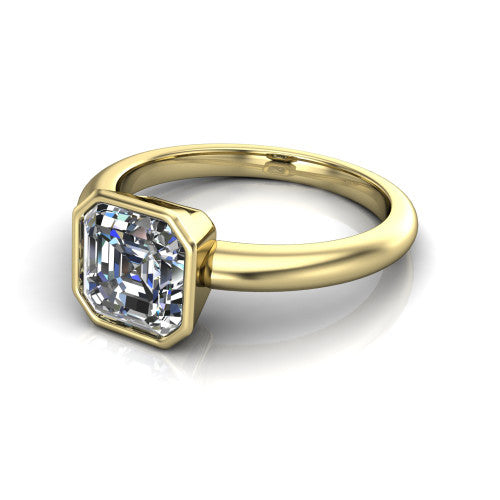 Lauren square emerald bezel solitaire engagement ring in 14K Yellow Gold, three-quarter perspective showing the bezel-set square emerald center diamond on a polished band