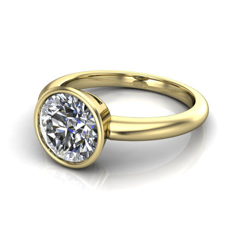 Lauren round bezel solitaire engagement ring in 14K Yellow Gold, three-quarter perspective showing the bezel-set round center diamond on a polished band