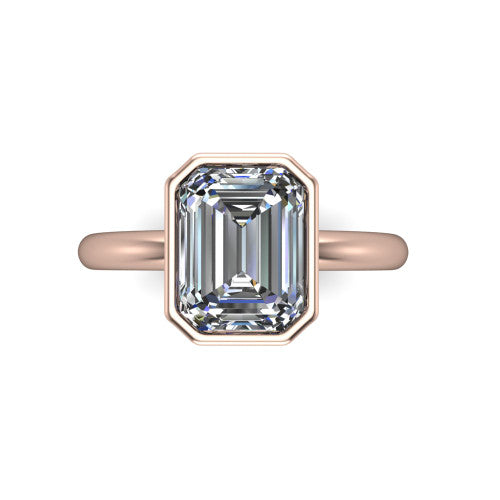 Lauren emerald bezel solitaire engagement ring in 14K Rose Gold, top-down view showing the emerald center diamond in a full metal bezel