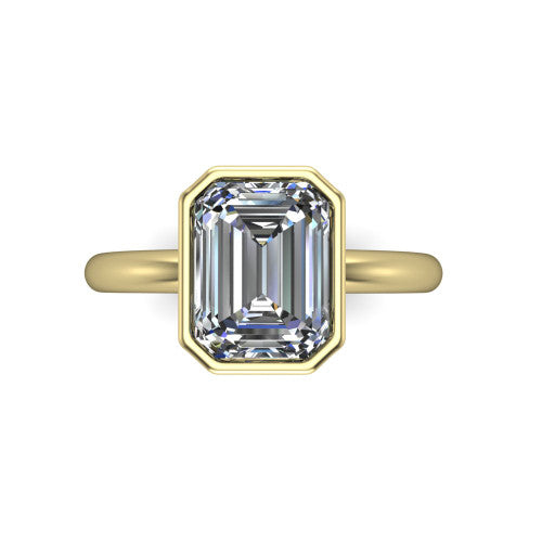 Lauren emerald bezel solitaire engagement ring in 18K Yellow Gold, top-down view showing the emerald center diamond in a full metal bezel
