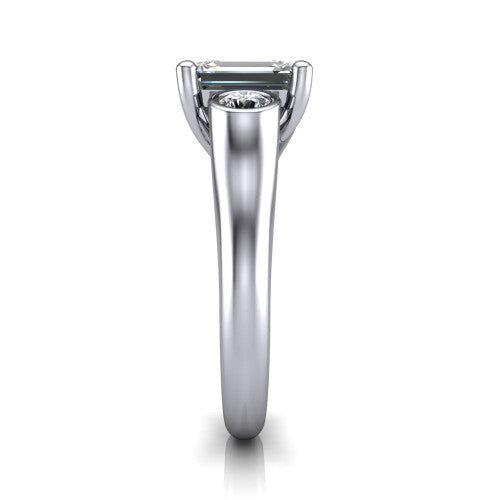 Rory emerald three stone engagement ring in 14K White Gold, side profile showing the bezel side stones and polished band