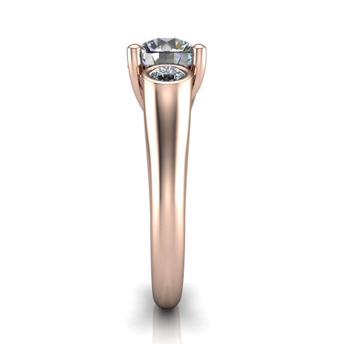 Rory round three stone engagement ring in 14K Rose Gold, side profile showing the bezel side stones and polished band