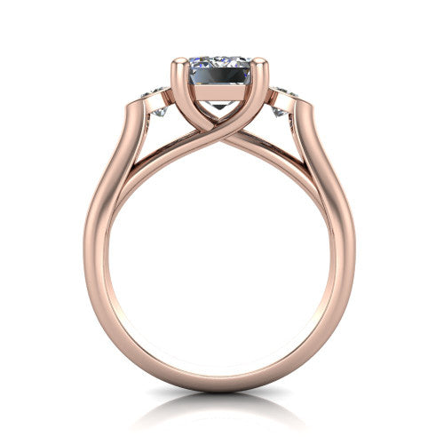 Rory emerald three stone engagement ring in 18K Rose Gold, through-finger front profile showing the open split basket and polished band