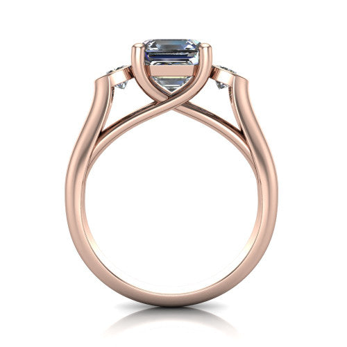 Rory square emerald three stone engagement ring in 14K Rose Gold, through-finger front profile showing the open split basket and polished band