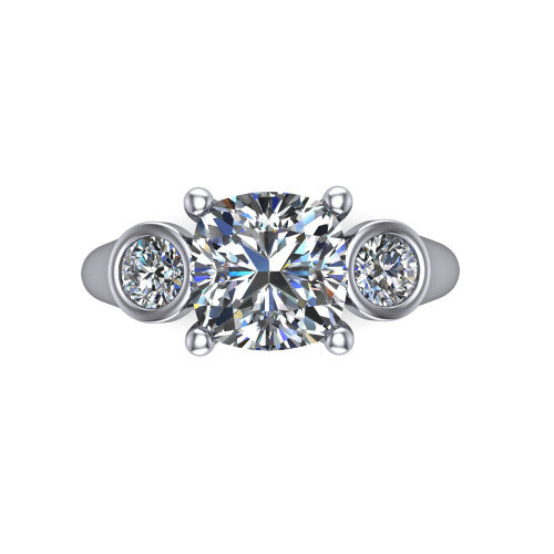 Rory cushion three stone engagement ring in 14K White Gold, top-down view showing the cushion center diamond and bezel-set round accents