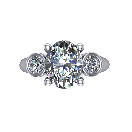 Rory oval three stone engagement ring in 18K White Gold, top-down view showing the oval center diamond and bezel-set round accents
