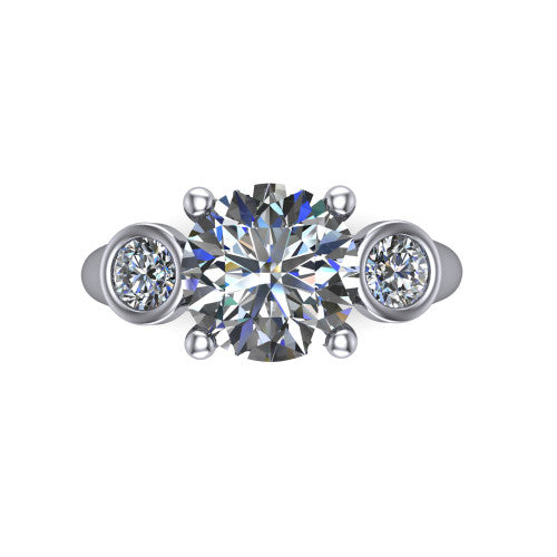 Rory round three stone engagement ring in 18K White Gold, top-down view showing the round center diamond and bezel-set round accents