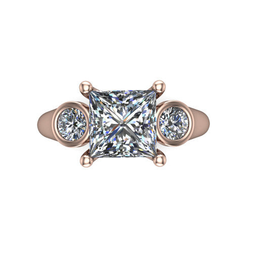 Rory princess three stone engagement ring in 18K Rose Gold, top-down view showing the princess center diamond and bezel-set round accents