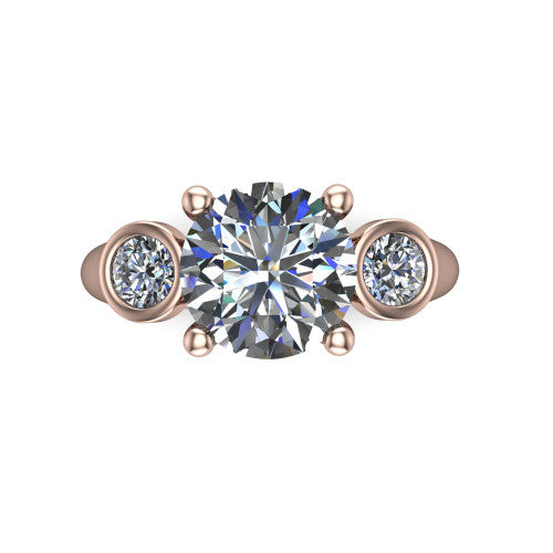 Rory round three stone engagement ring in 14K Rose Gold, top-down view showing the round center diamond and bezel-set round accents