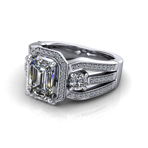 Luciana emerald halo engagement ring in Platinum, three-quarter perspective showing the emerald center diamond in a pave halo with round side accents and a split pave band