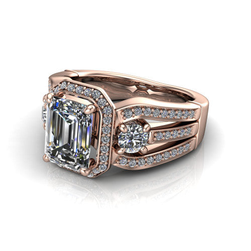 Luciana emerald halo engagement ring in 14K Rose Gold, three-quarter perspective showing the emerald center diamond in a pave halo with round side accents and a split pave band