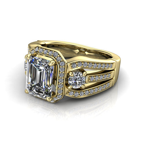 Luciana emerald halo engagement ring in 18K Yellow Gold, three-quarter perspective showing the emerald center diamond in a pave halo with round side accents and a split pave band