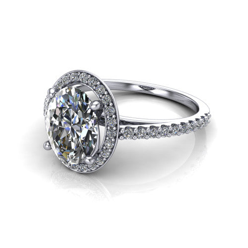 Oaklyn oval halo engagement ring in 18K White Gold, three-quarter perspective showing the brilliant oval center diamond inside a pave halo on pave-set shoulders rising into a cathedral basket