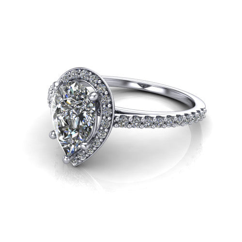 Oaklyn pear halo engagement ring in Platinum, three-quarter perspective showing the brilliant pear-cut center diamond inside a pave halo on pave-set shoulders rising into a cathedral basket