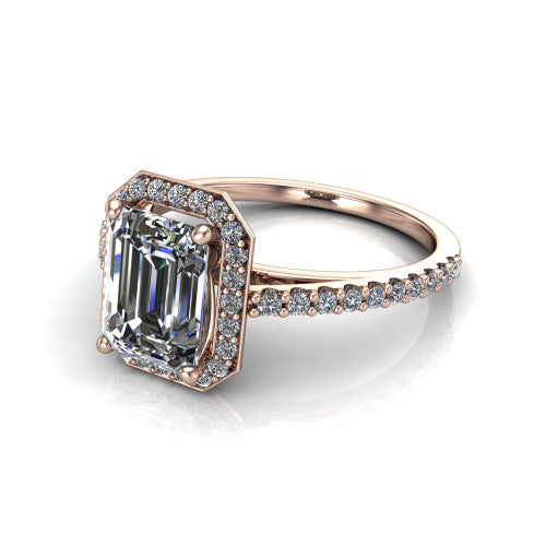 Oaklyn emerald halo engagement ring in 18K Rose Gold, three-quarter perspective showing the step-cut emerald center diamond inside a pave halo on pave-set shoulders rising into a cathedral basket