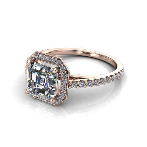 Oaklyn square emerald halo engagement ring in 14K Rose Gold, three-quarter perspective showing the step-cut square emerald center diamond inside a pave halo on pave-set shoulders rising into a cathedral basket