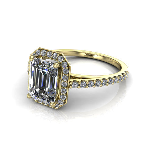 Oaklyn emerald halo engagement ring in 18K Yellow Gold, three-quarter perspective showing the step-cut emerald center diamond inside a pave halo on pave-set shoulders rising into a cathedral basket