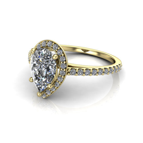 Oaklyn pear halo engagement ring in 14K Yellow Gold, three-quarter perspective showing the brilliant pear-cut center diamond inside a pave halo on pave-set shoulders rising into a cathedral basket