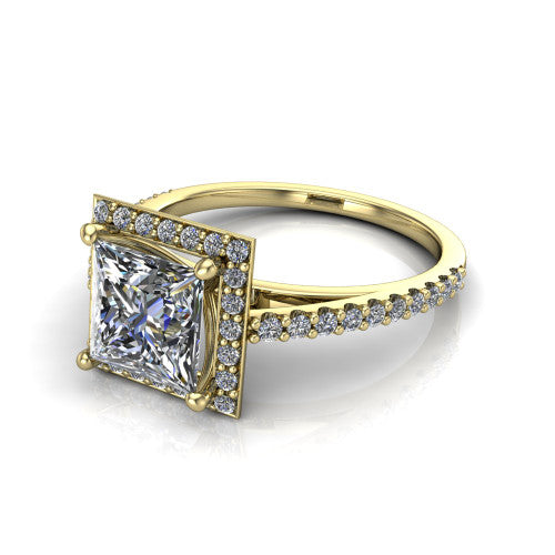 Oaklyn princess halo engagement ring in 18K Yellow Gold, three-quarter perspective showing the brilliant princess-cut center diamond inside a pave halo on pave-set shoulders rising into a cathedral basket