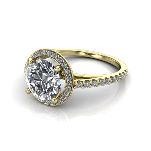 Oaklyn round halo engagement ring in 18K Yellow Gold, three-quarter perspective showing the brilliant round center diamond inside a pave halo on pave-set shoulders rising into a cathedral basket