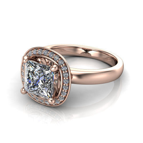 Aubree princess halo engagement ring in 14K Rose Gold, three-quarter perspective showing the brilliant princess-cut center diamond inside a cushion-shaped pave halo on a smooth polished band