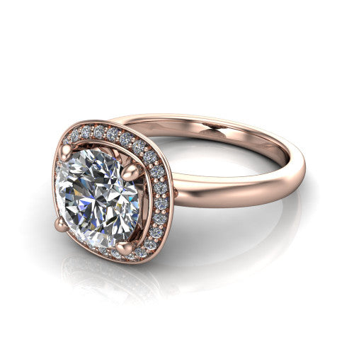 Aubree round halo engagement ring in 14K Rose Gold, three-quarter perspective showing the brilliant round center diamond inside a cushion-shaped pave halo on a smooth polished band