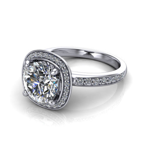 Winter round halo engagement ring in 18K White Gold, three-quarter perspective showing the brilliant round center diamond inside a pave halo on pave-set shoulders