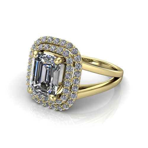 Danna emerald double halo engagement ring in 14K Yellow Gold, three-quarter perspective showing the emerald center diamond in a double pave halo above a split-shank band