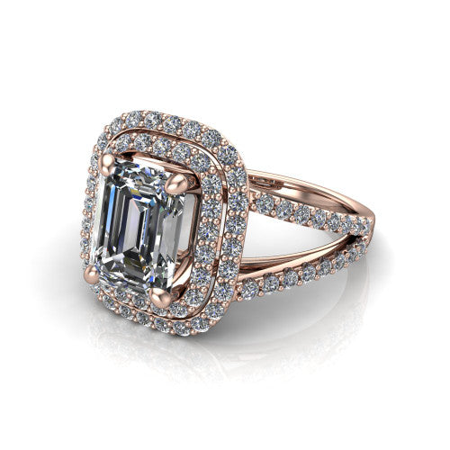 Brynn emerald double halo engagement ring in 18K Rose Gold, three-quarter perspective showing the emerald center diamond in a double pave halo above a split-shank band