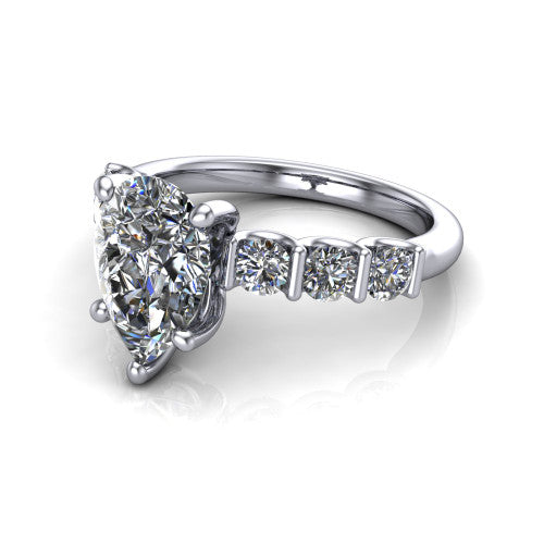 Liora pear solitaire engagement ring in 18K White Gold, three-quarter perspective showing the pear center diamond with graduated round side accents on a polished band