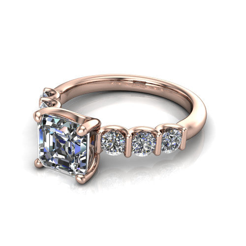 Liora square emerald solitaire engagement ring in 14K Rose Gold, three-quarter perspective showing the square emerald center diamond with graduated round side accents on a polished band