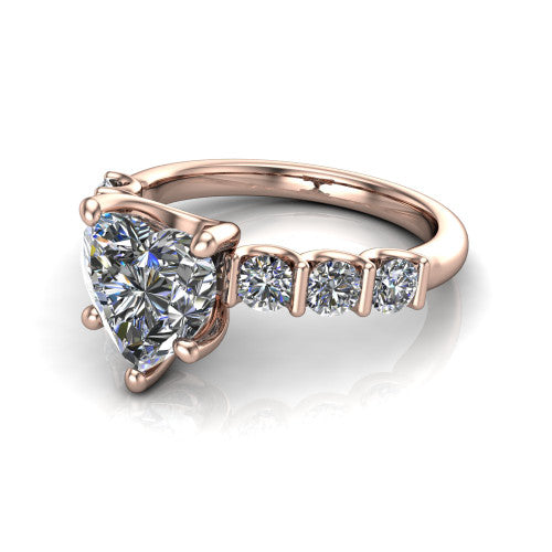 Liora heart solitaire engagement ring in 18K Rose Gold, three-quarter perspective showing the heart center diamond with graduated round side accents on a polished band
