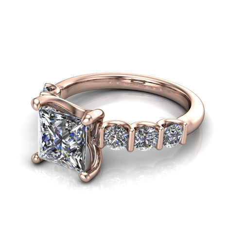 Liora princess solitaire engagement ring in 18K Rose Gold, three-quarter perspective showing the princess center diamond with graduated round side accents on a polished band