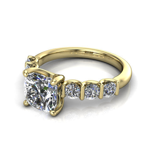 Liora cushion solitaire engagement ring in 18K Yellow Gold, three-quarter perspective showing the cushion center diamond with graduated round side accents on a polished band