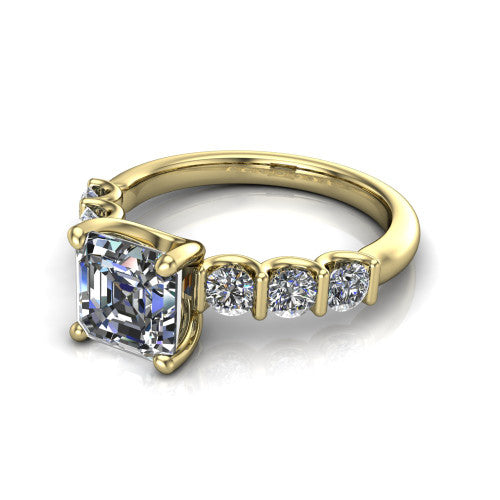 Liora square emerald solitaire engagement ring in 14K Yellow Gold, three-quarter perspective showing the square emerald center diamond with graduated round side accents on a polished band