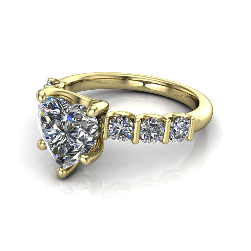 Liora heart solitaire engagement ring in 14K Yellow Gold, three-quarter perspective showing the heart center diamond with graduated round side accents on a polished band
