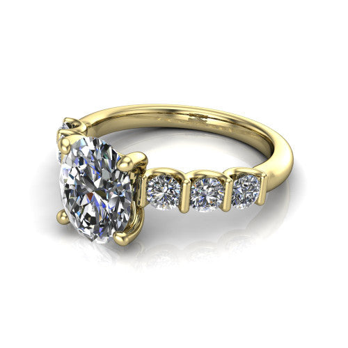 Liora oval solitaire engagement ring in 14K Yellow Gold, three-quarter perspective showing the oval center diamond with graduated round side accents on a polished band