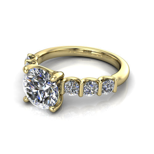 Liora round solitaire engagement ring in 14K Yellow Gold, three-quarter perspective showing the round center diamond with graduated round side accents on a polished band