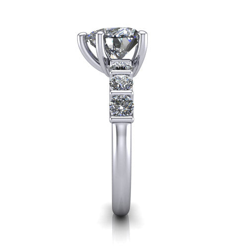 Liora heart solitaire engagement ring in Platinum, side profile showing the side accents and polished band